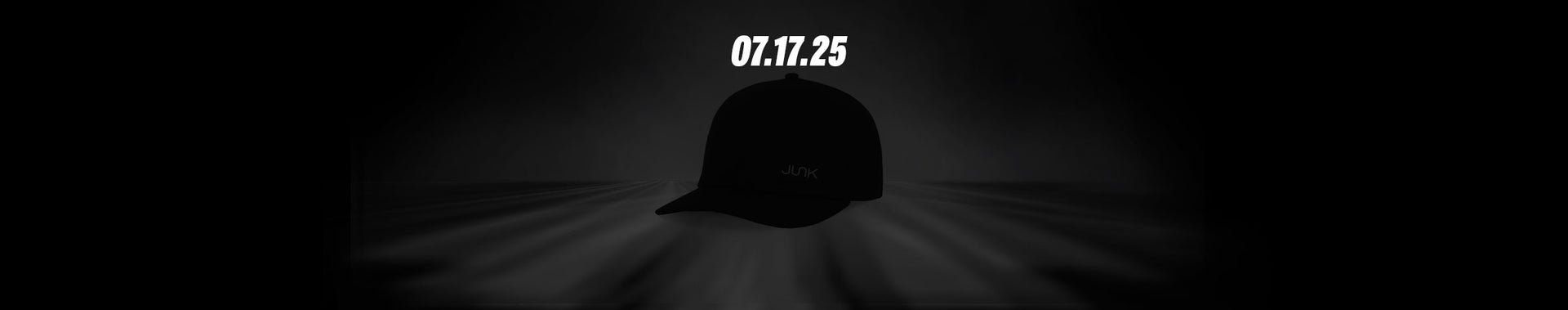 Black cap on a dark background with '07.17.25' text