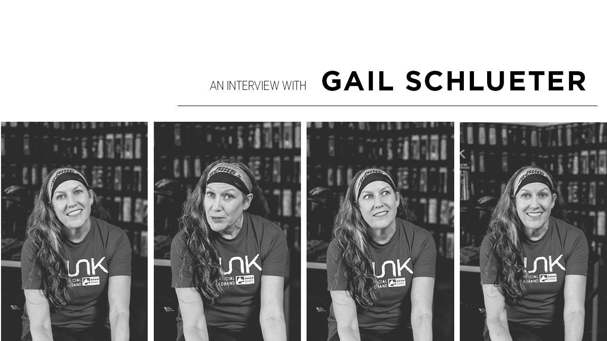Four black and white images of a late middle aged white woman in a JUNK headband wearing a JUNK t shirt in the JUNK retail room. The text reads "An interview with Gail Schlueter"