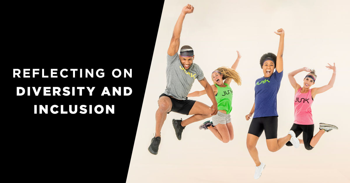 four different people jump into the air and the text overlay says reflecting on diversity and inclusion