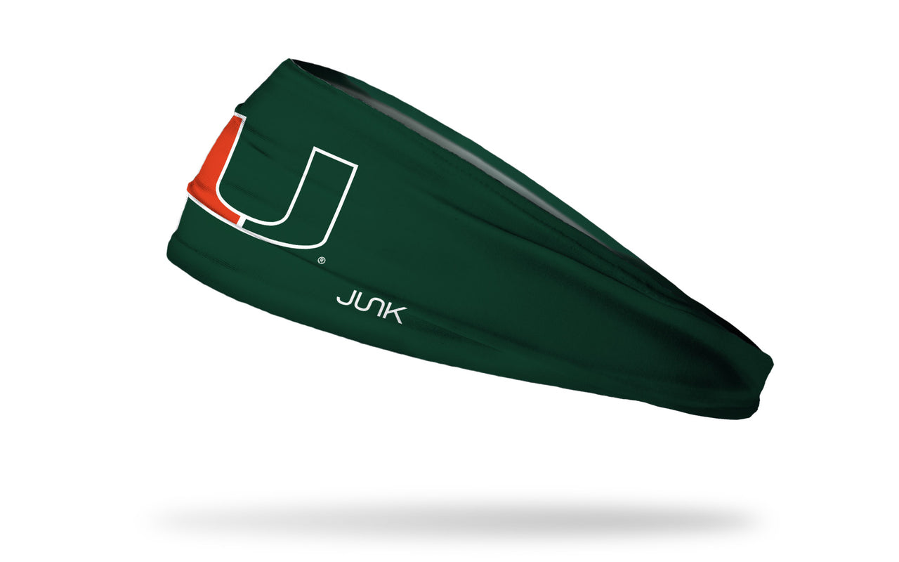 green headband with University of Miami U logo in orange and green with white outline
