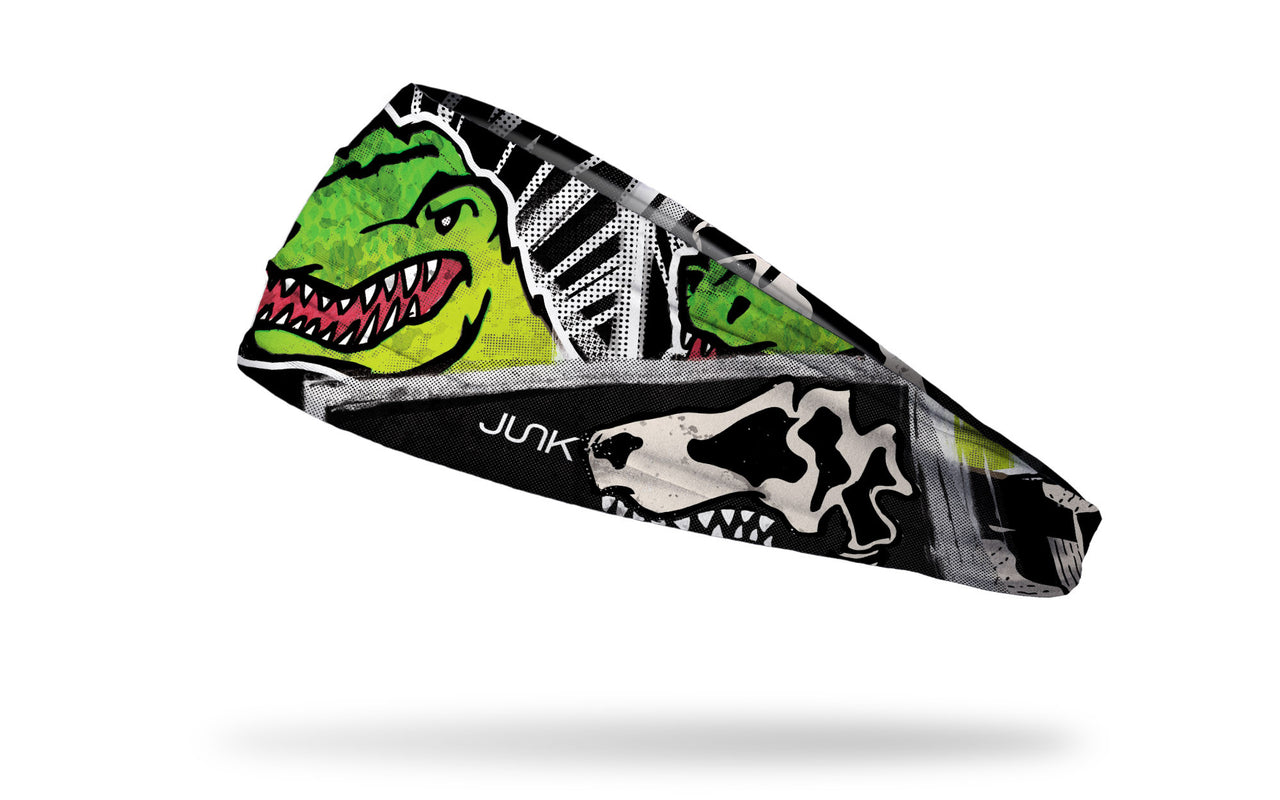 black and white dinosaur themed headband with bright green t-rex focus