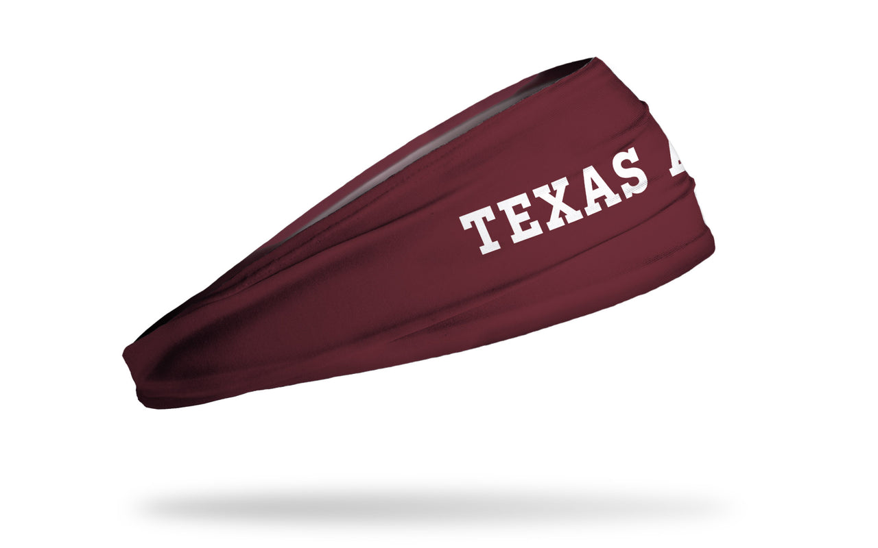 maroon headband with Texas A&M University Texas A&M wordmark in white