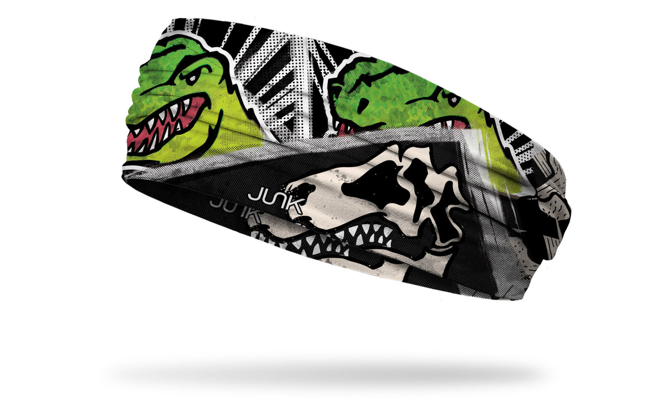 black and white dinosaur themed headband with bright green t-rex focus