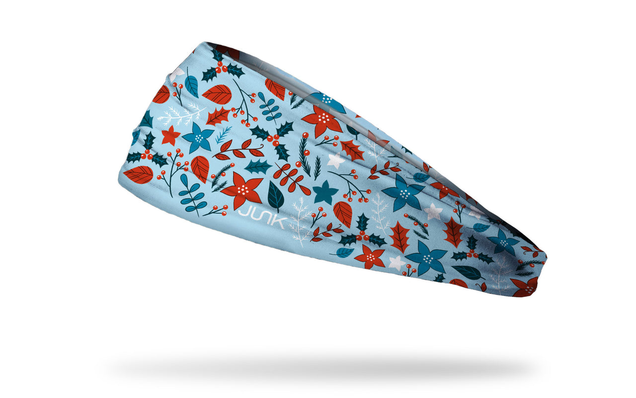 light blue winter christmas themed headband with poinsetta flowers stars holly pine branches