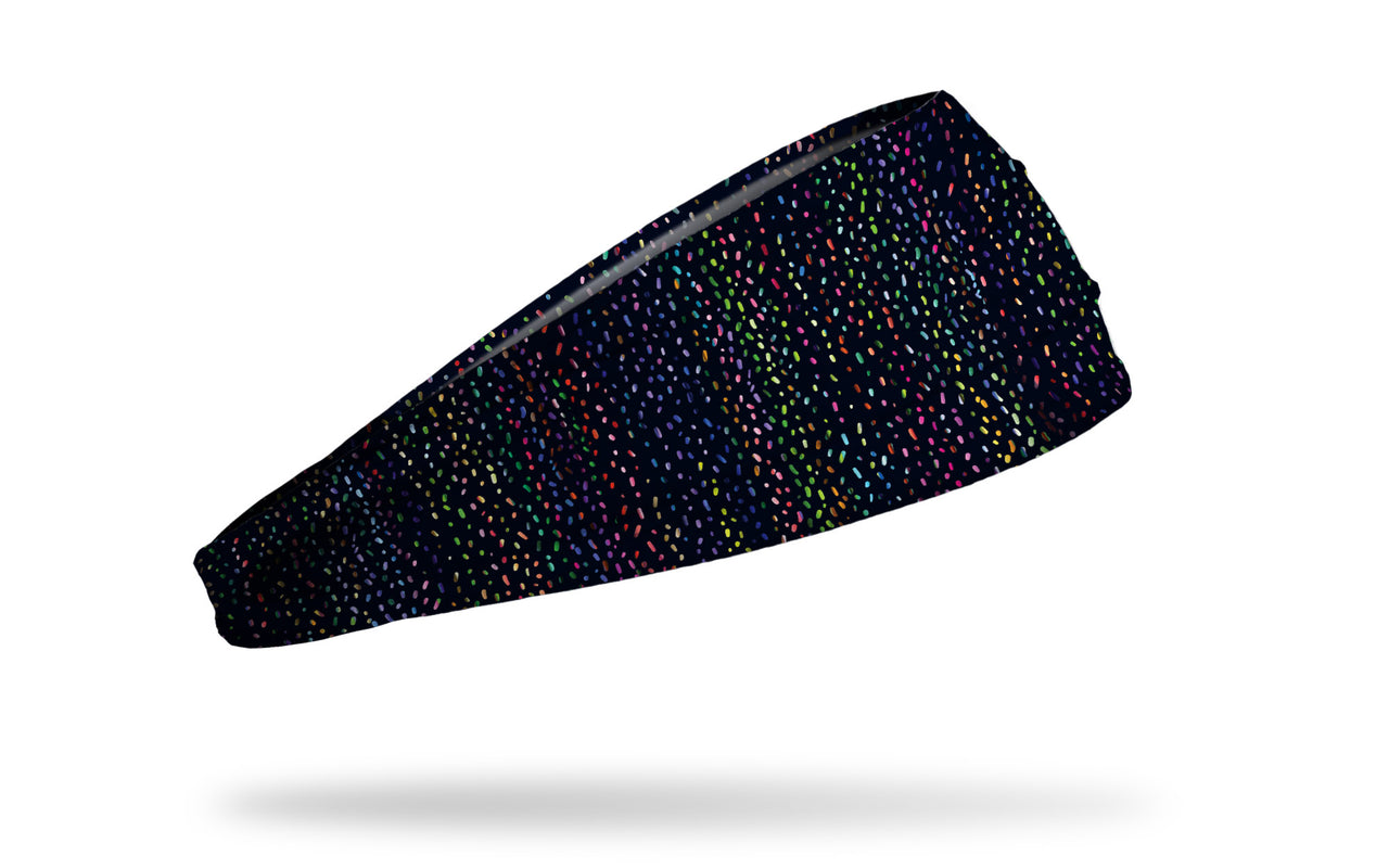 black headband with repeating pattern of confetti in bright colors