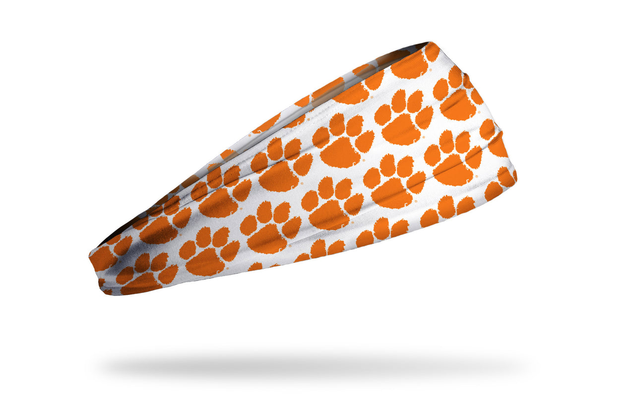 white headband with Clemson University paw print logo repeating in orange