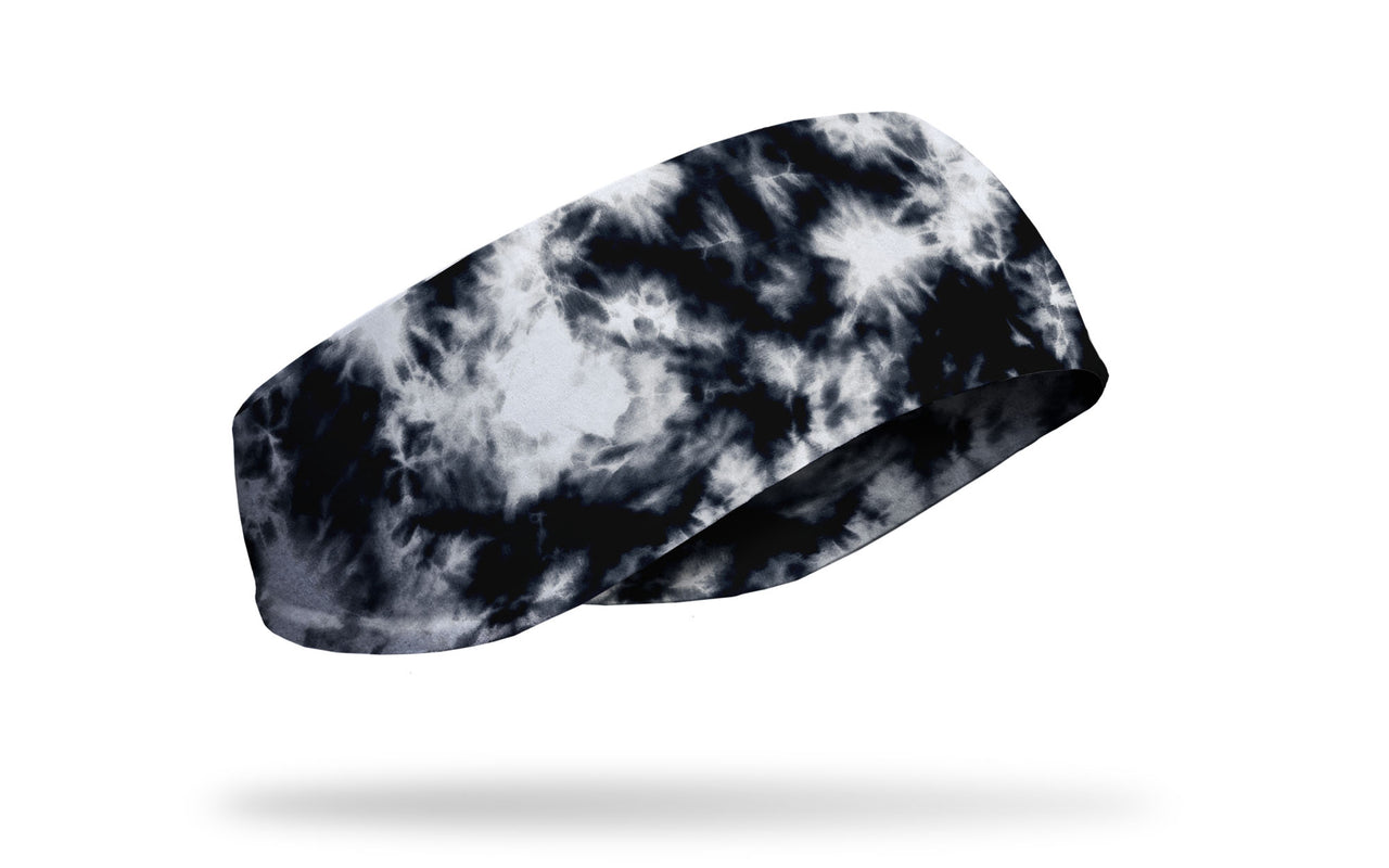 black and white ear warmer clouds on a black background