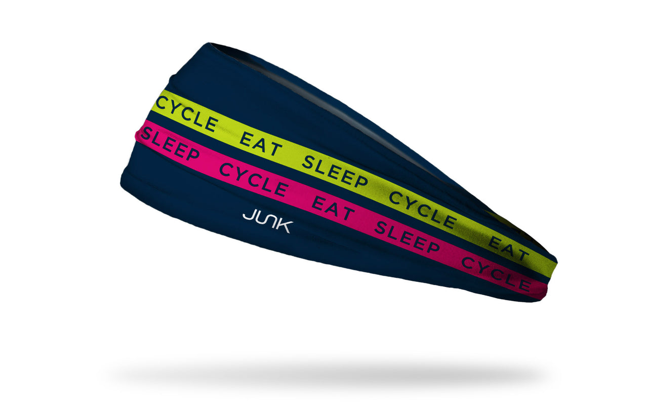 navy headband with red and yellow bands that say eat sleep cycle in a repeating pattern