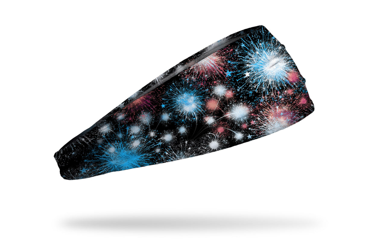 black headband with red white and blue fireworks graphics, some turning into stars