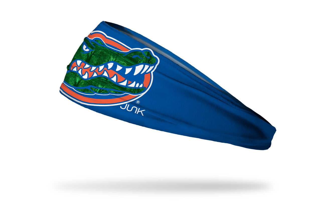 blue headband with University of Florida gator logo in orange white and green gator skin print