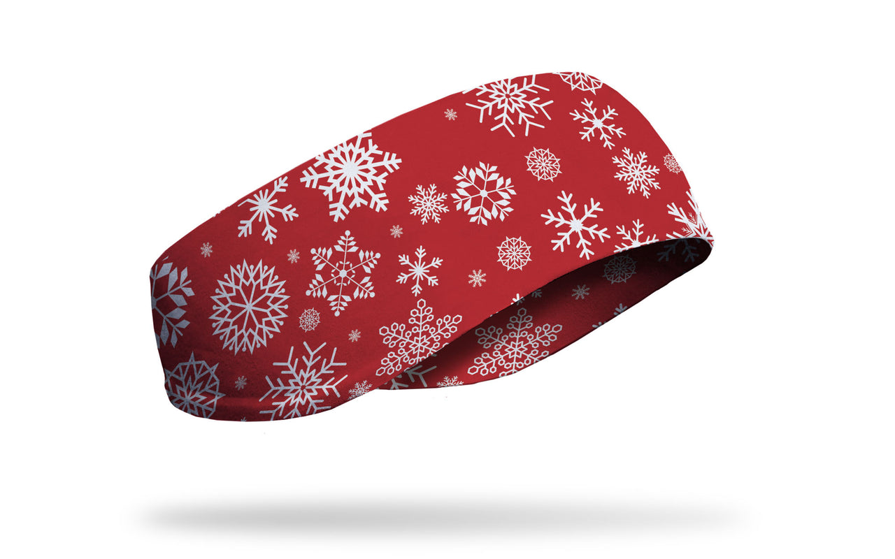 white snowflakes on red ear warmer right side