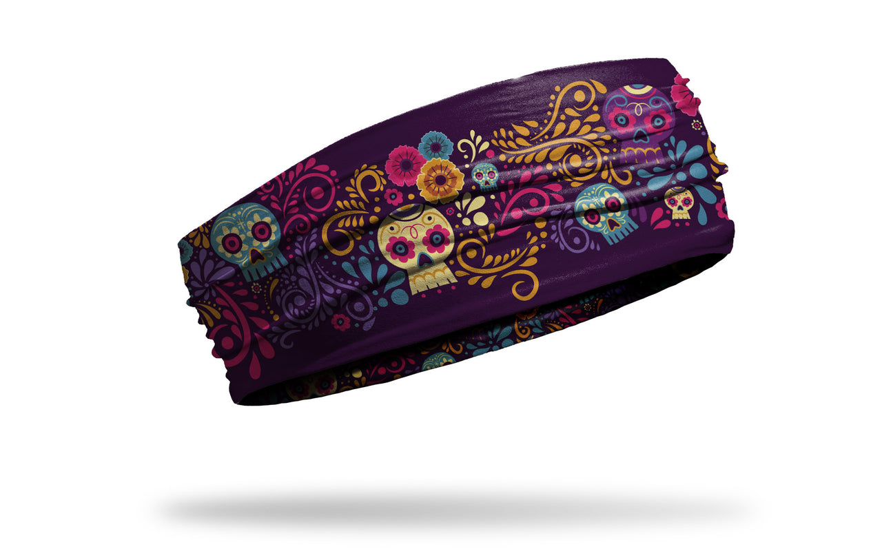 dark purple headband with turquoise cream gold and bright pink floral accents and sugar skulls