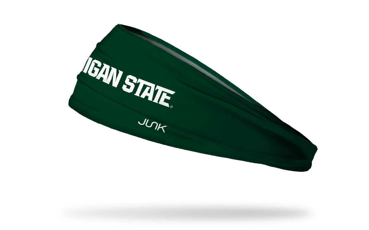 green headband with Michigan State University "Michigan State" wordmark in white