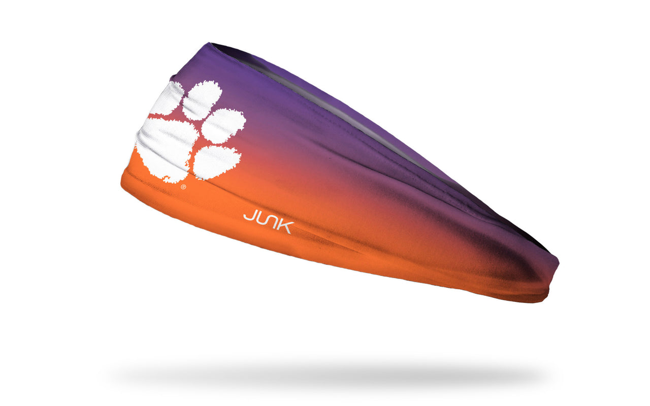 gradient purple to orange headband with Clemson University paw print logo in white