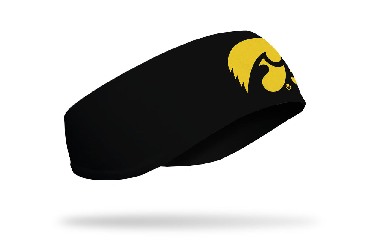 black ear warmer with University of Iowa tiger hawk logo in gold