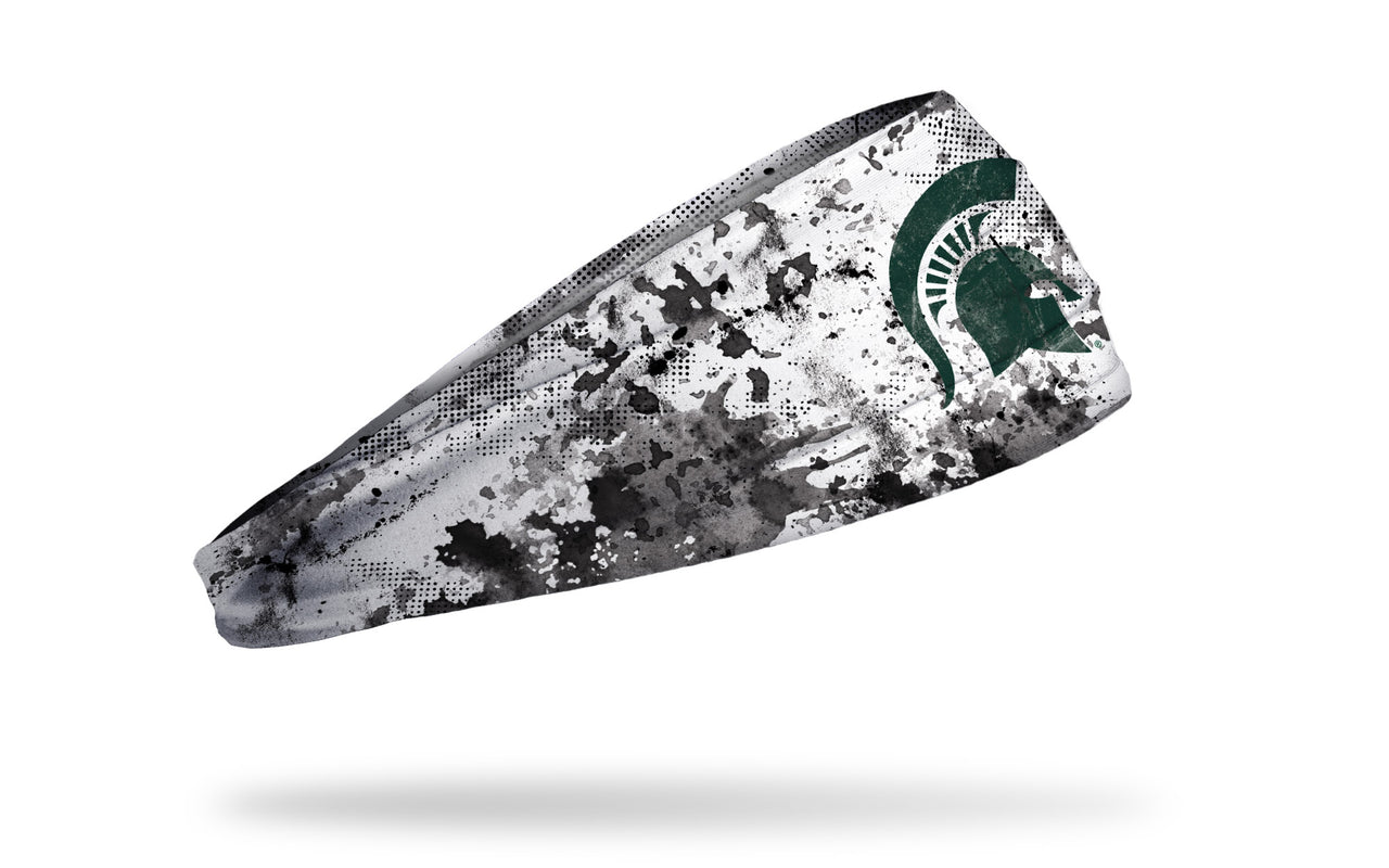 white headband with Michigan State University spartan logo in green with black grunge overlay