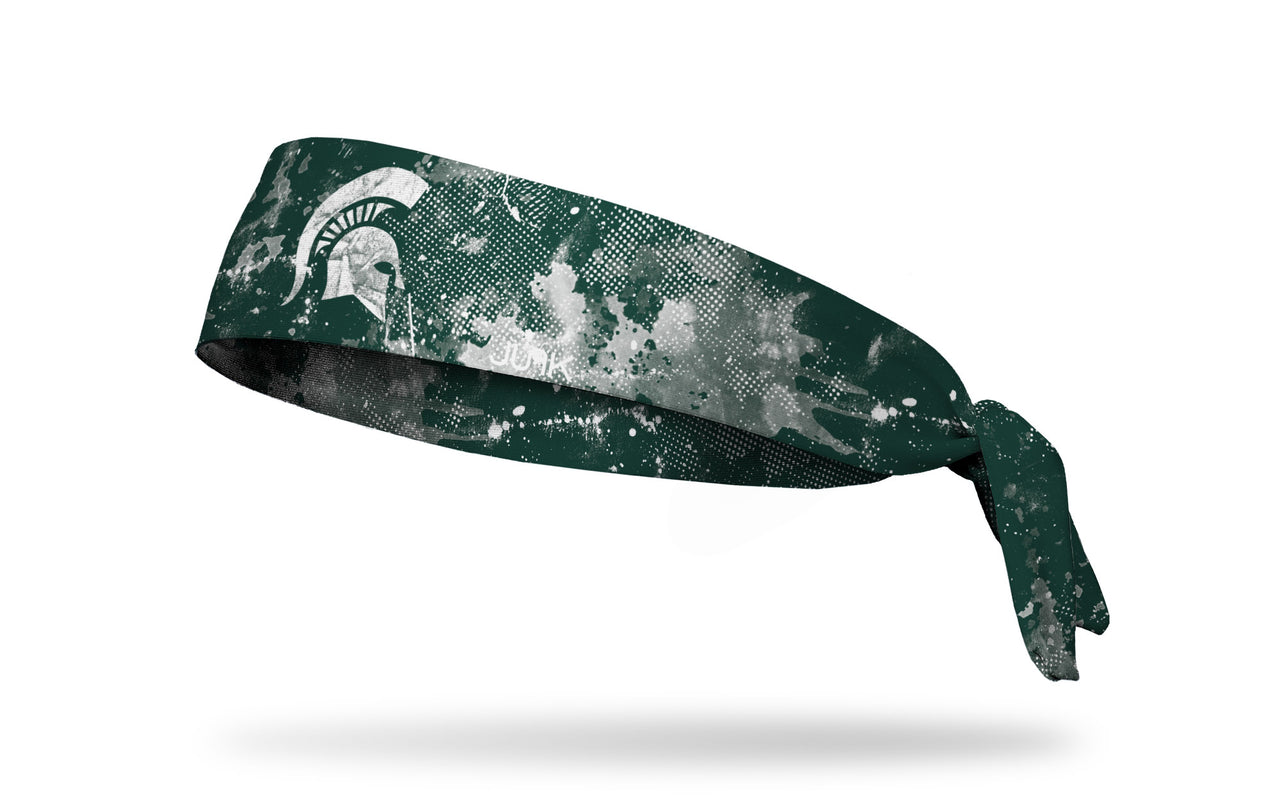 green headband with Michigan State University spartan logo in white with white grunge overlay