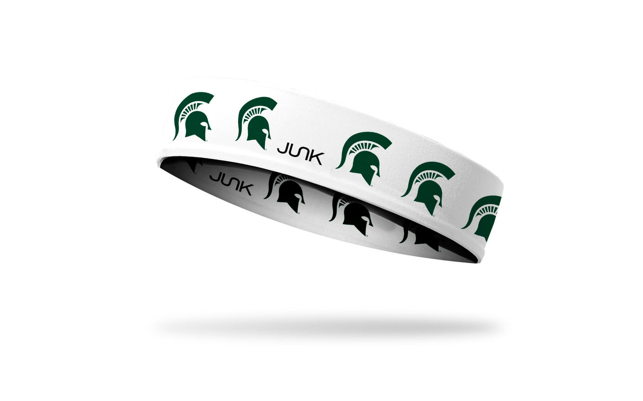 white headband with Michigan State University spartan logo repeating in green