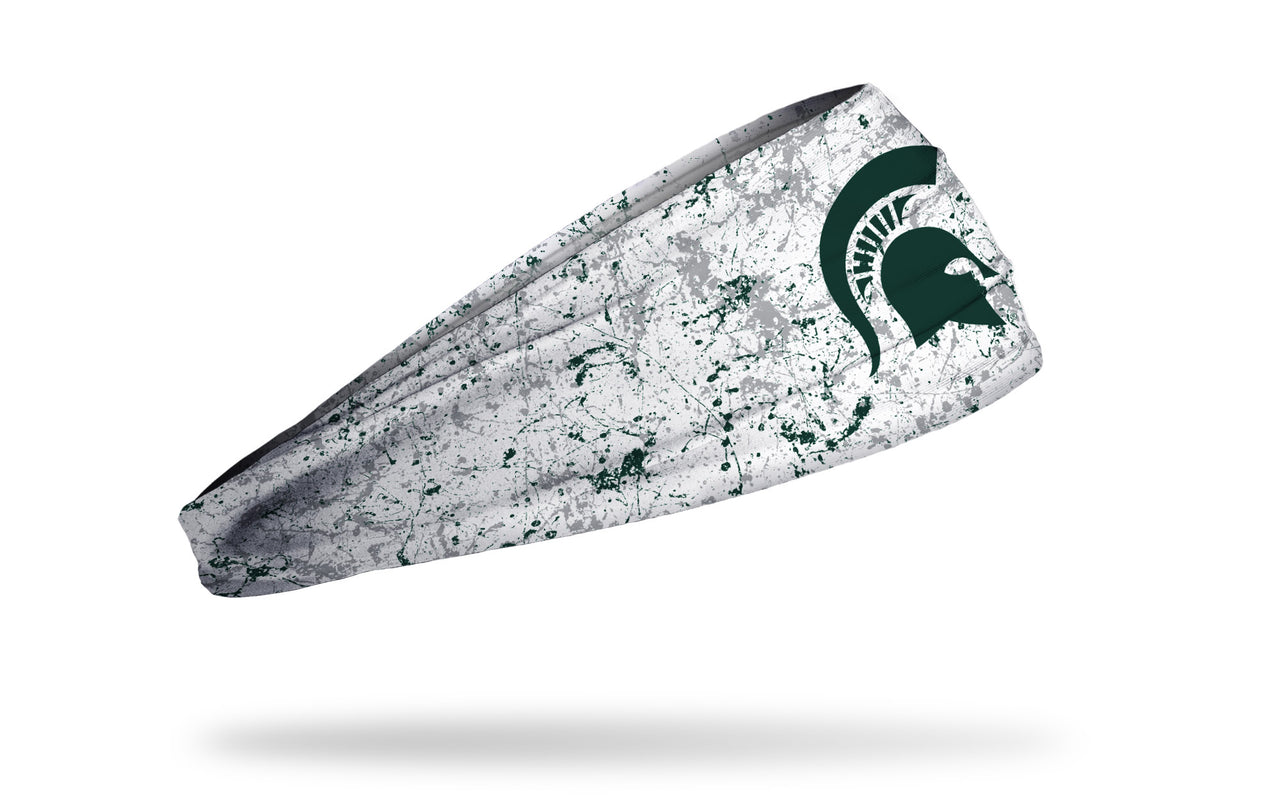 white paint splatter headband with Michigan State University spartan logo in green