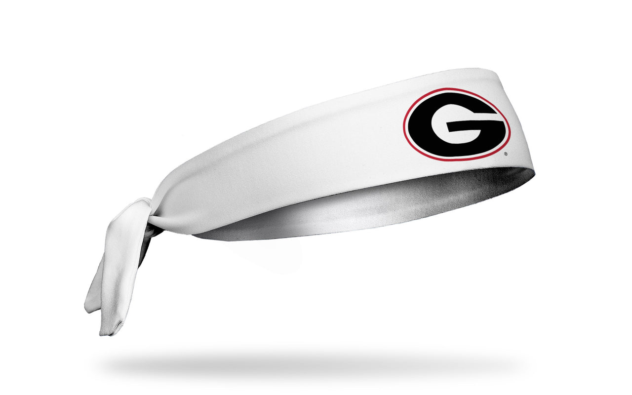 white headband with University of Georgia G logo in red and black