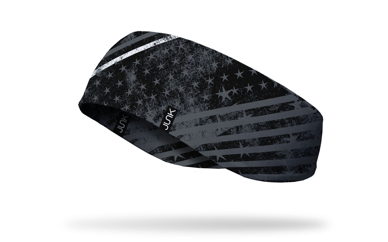 black ear warmer with grey stars and stripes grunge pattern and thin white line