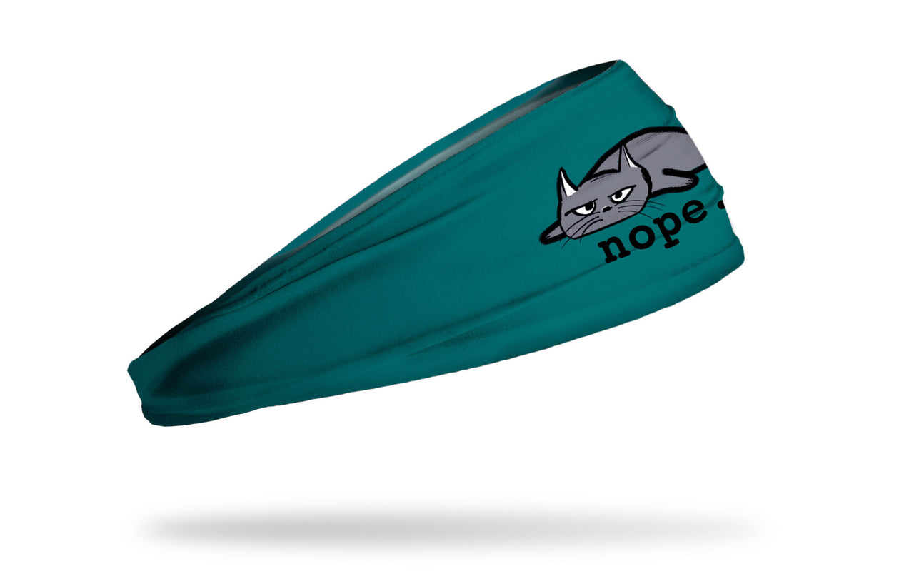 cat themed headband with a grey tired cat and the wordmark nope.