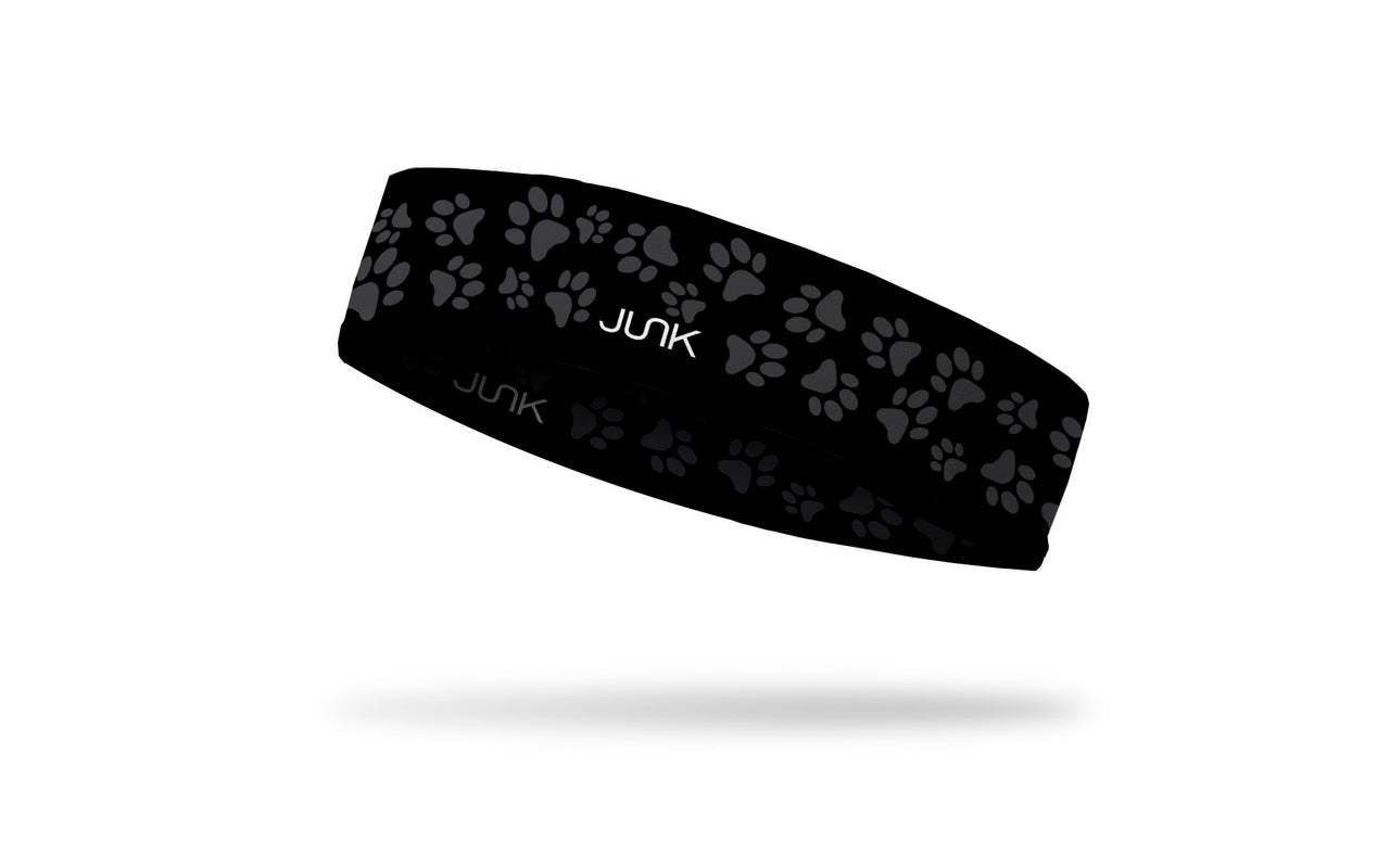 black headband with grey paw print repeating pattern