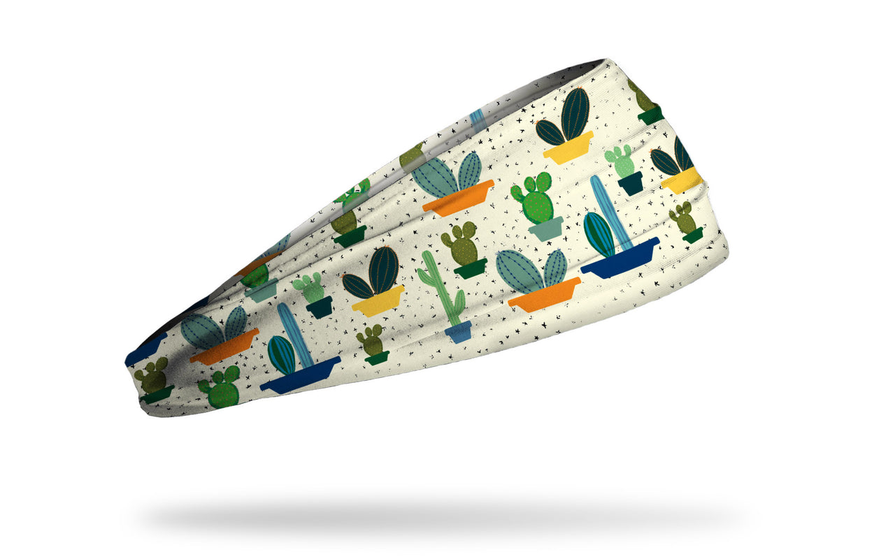 light yellow headband with repeating pattern of cactus plants