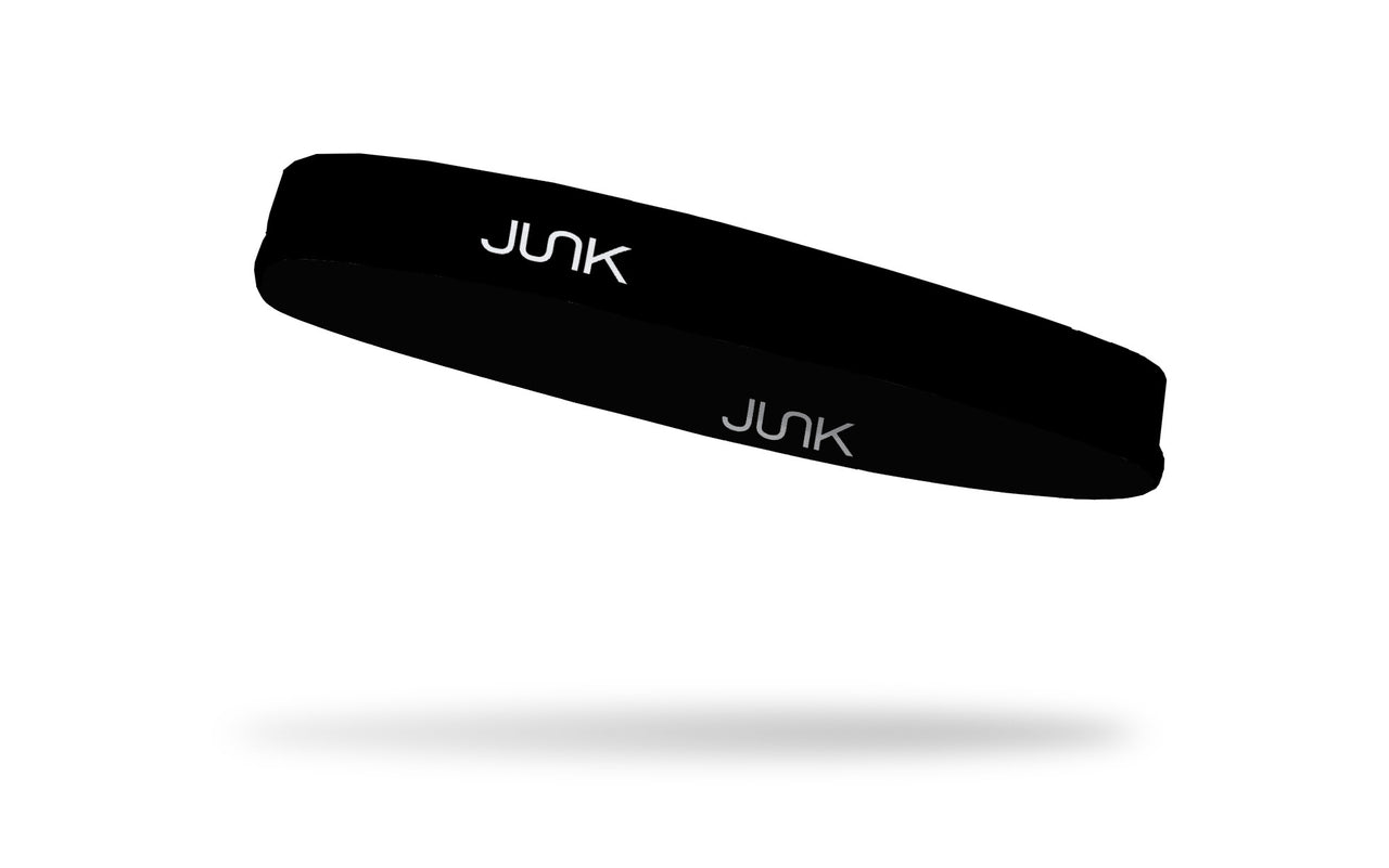 left side view of all black JUNK thin band headband