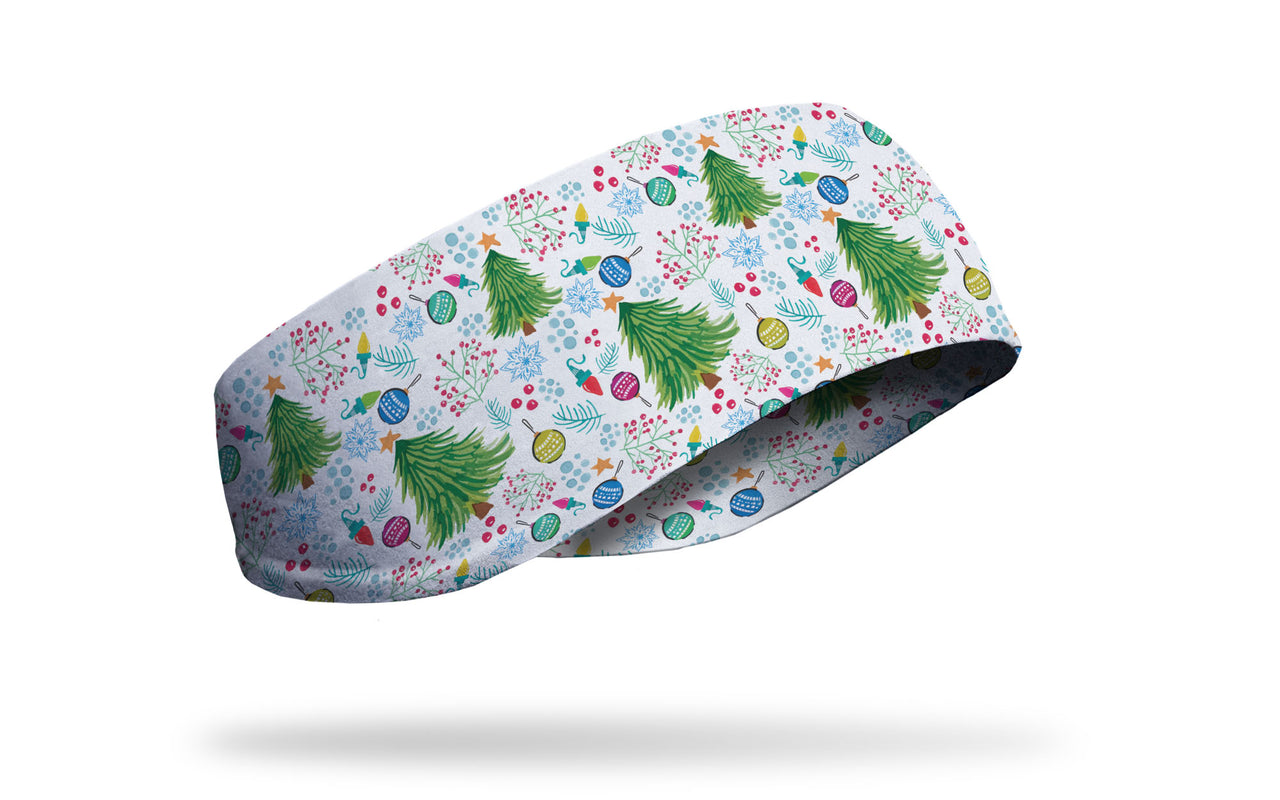white headband with repeating pattern of trees decorated with colorful ornaments