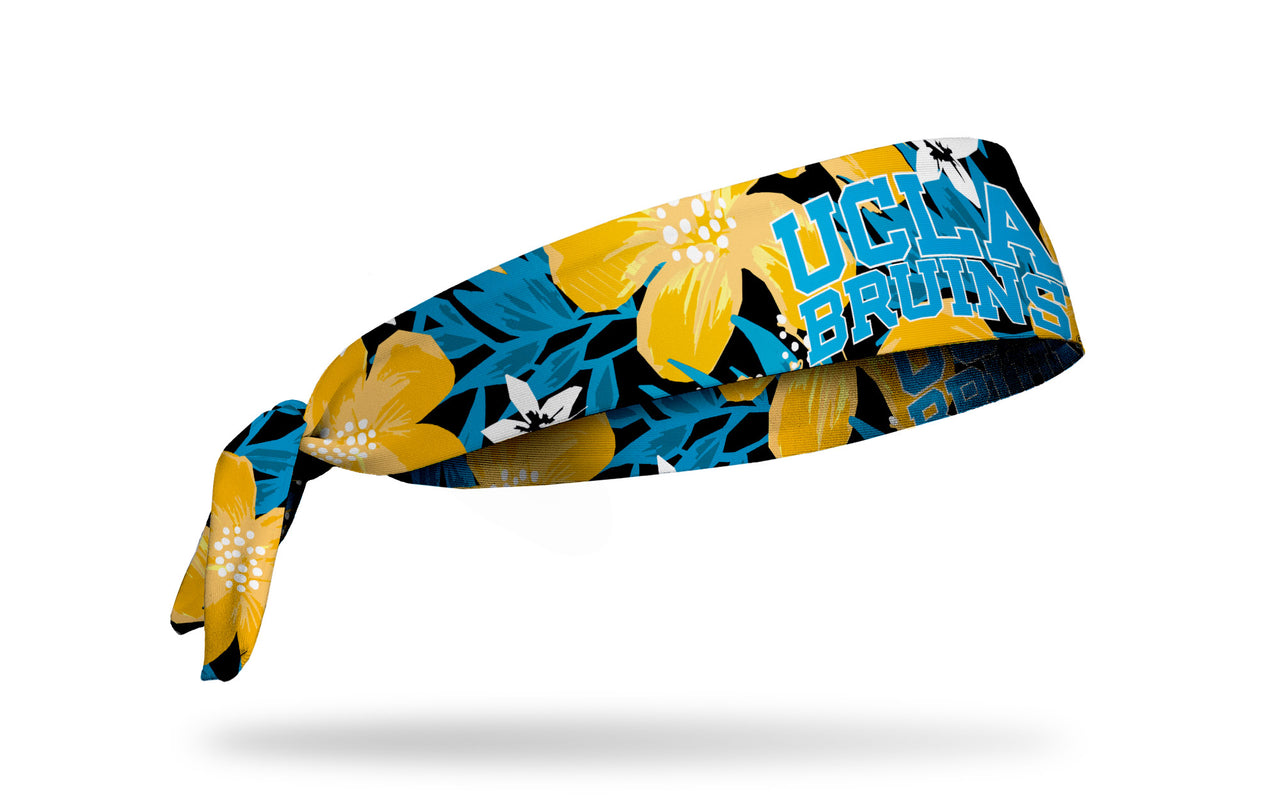 black headband with light blue, white, and gold floral print and University of California, Los Angeles UCLA Bruins wordmark in light blue and white outline
