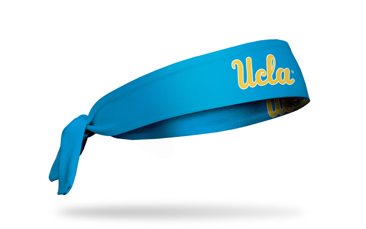 light blue headband with University of California, Los Angeles UCLA wordmark in gold and white