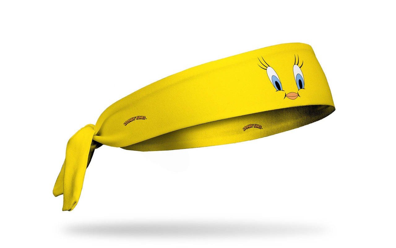 yellow headband with Looney Tunes Tweety Bird oversized face view design